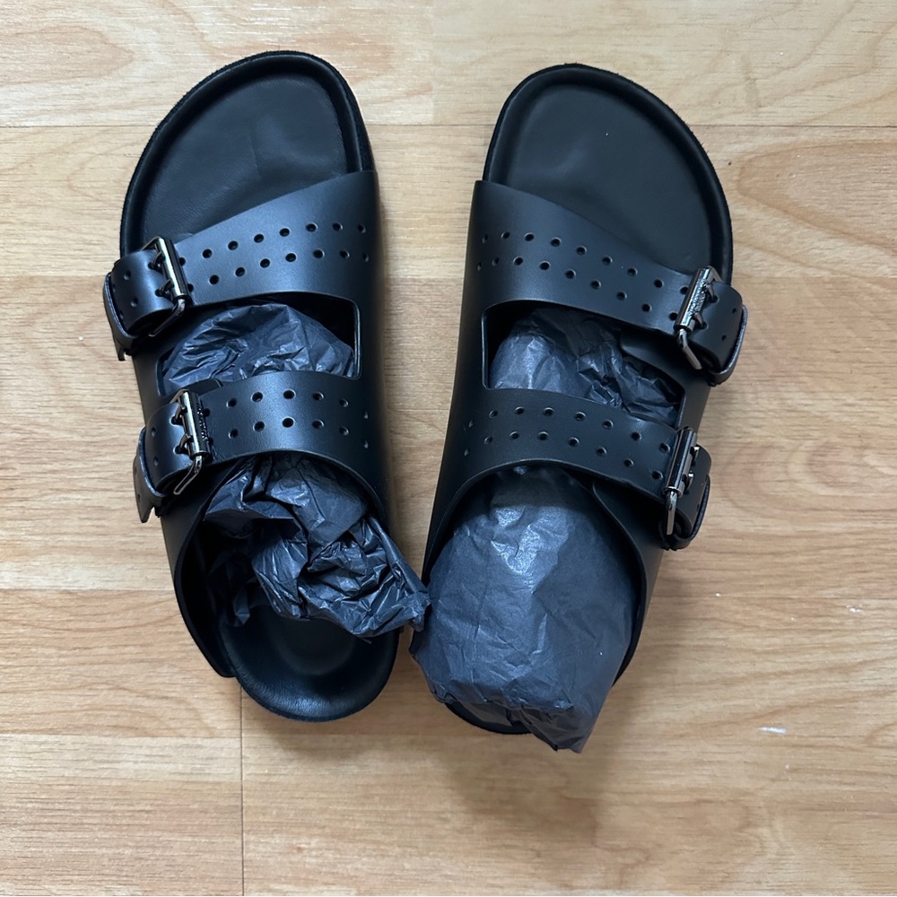 The Kooples women’s black leather sandals